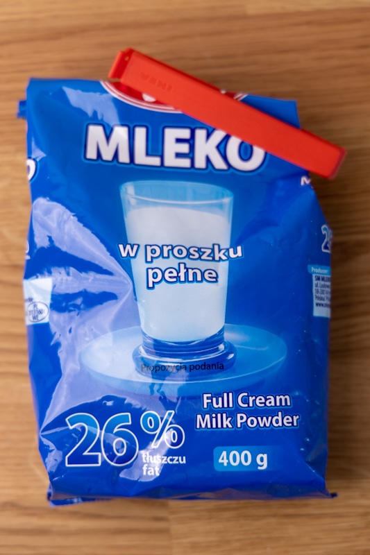 Powdered milk sealed with a clip