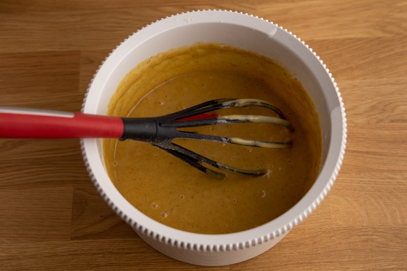 Prepping batter for pumpkin bread