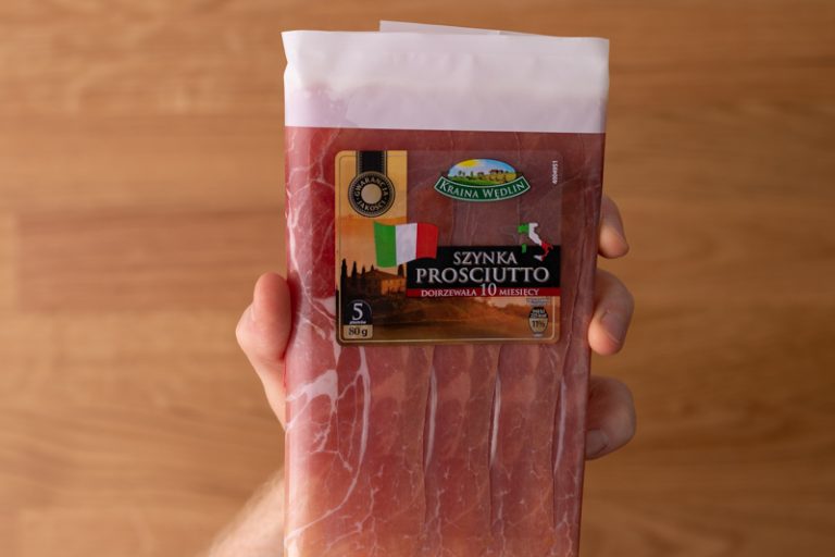 Prosciutto package in hand