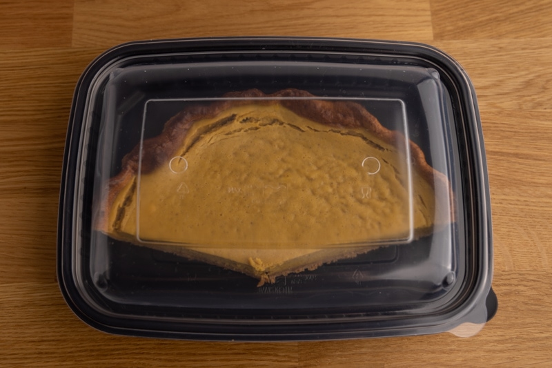 Pumpkin pie in a food container