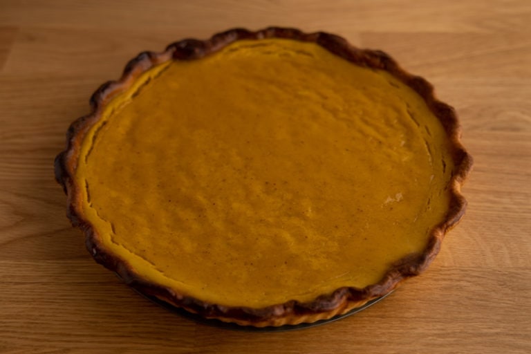 Freshly baked pumpkin pie in a pie pan
