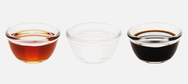 Bowls of red, white, and black vinegar