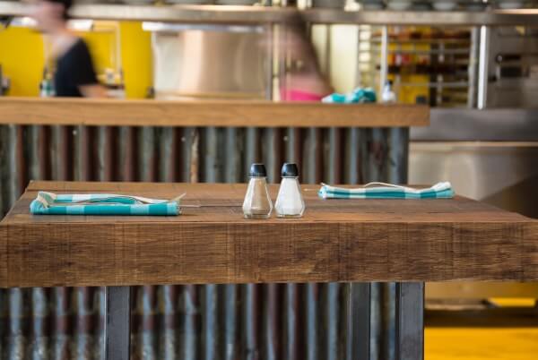 Salt and pepper shakers on a table