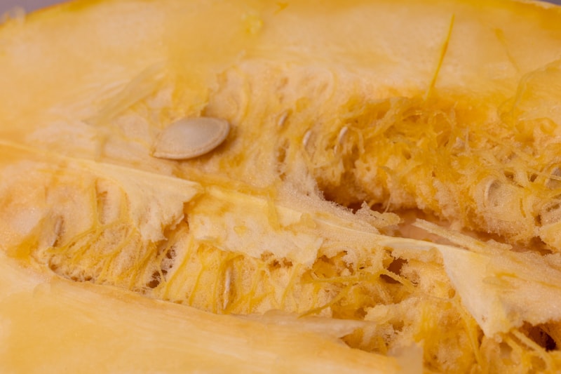 Seeds and flesh of spaghetti squash