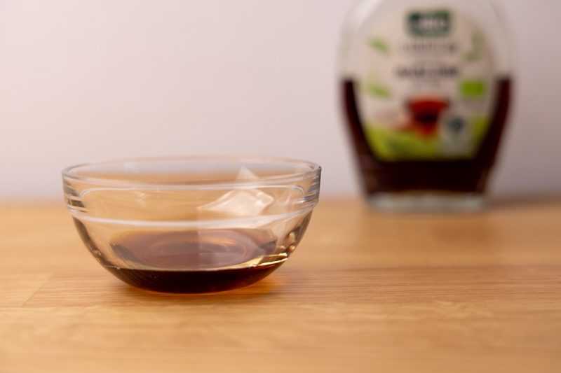 Small bowl of maple syrup