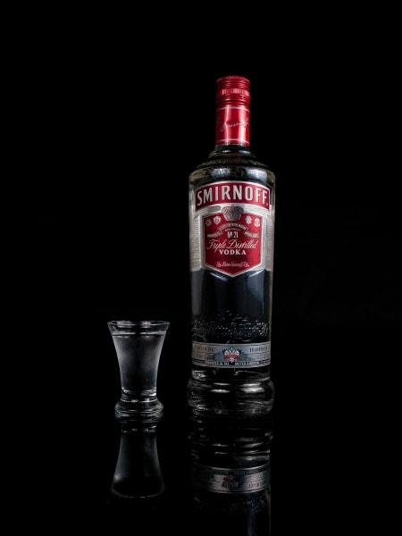 Smirnoff vodka and a shot glass