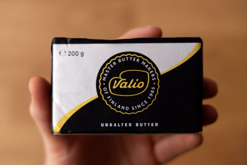 Stick of butter in a hand