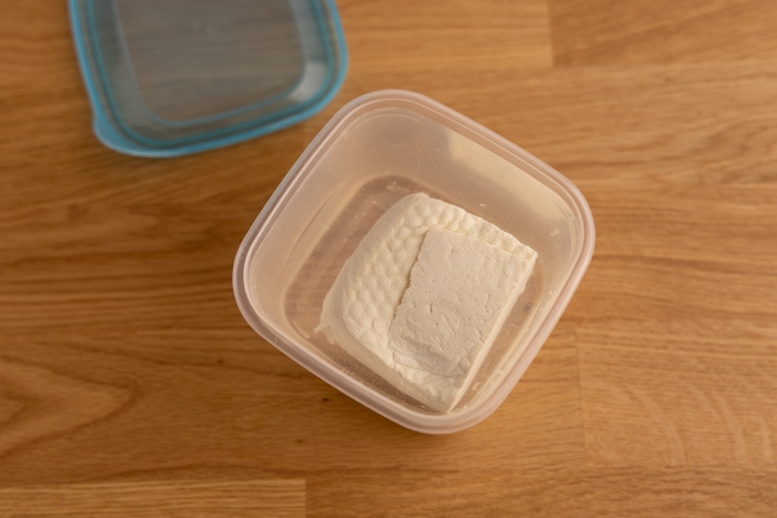 Storing tofu submerged in water