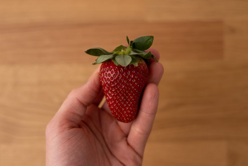 Strawberry in hand