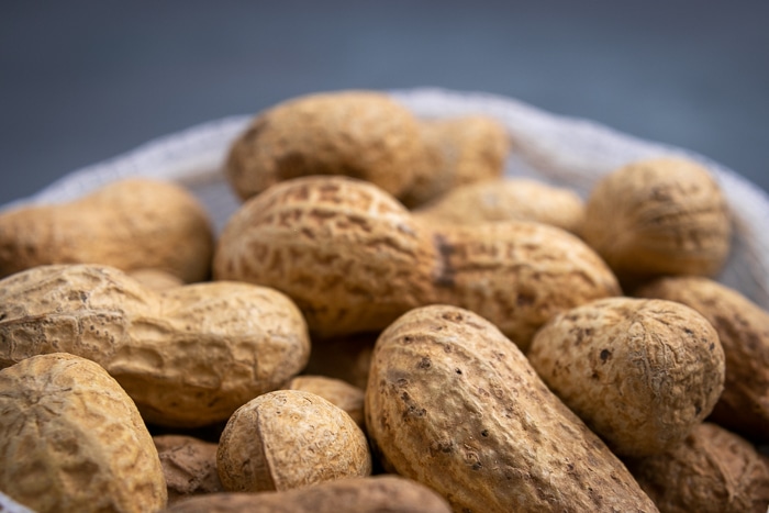 Unshelled peanuts in a mesh bag