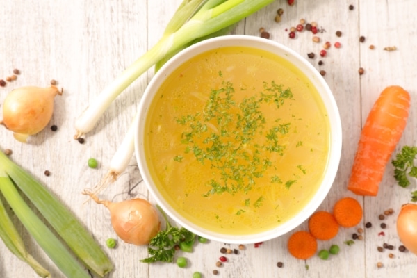 Vegetable broth in a white plate