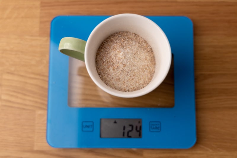 Weighing flour in a cup