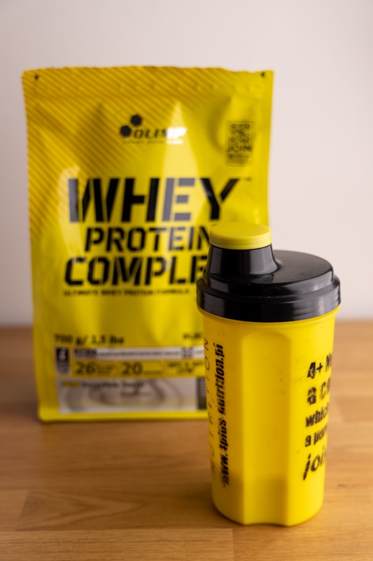 Whey protein and a shaker bottle