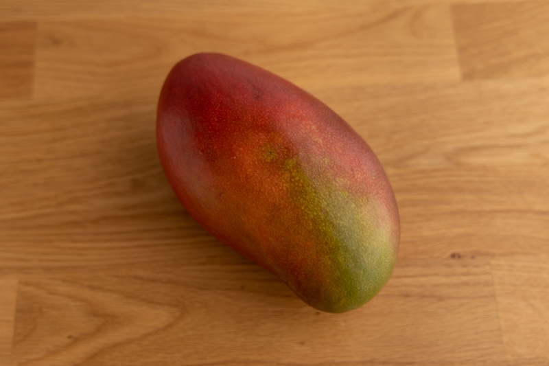 Whole mango before cutting