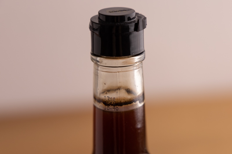 Worcestershire sauce: sediment on neck